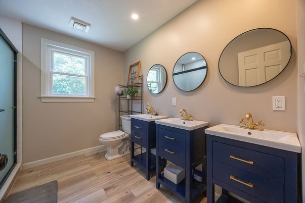 Bathroom, Dual Sink Vanities, Interior, Recessed Lighting, Wood Texture Flooring