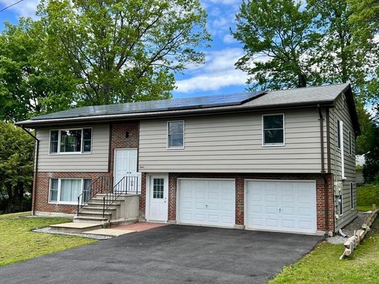Attached, Exterior, Facade, Brick Facade, Solar Panels, Raised Ranch