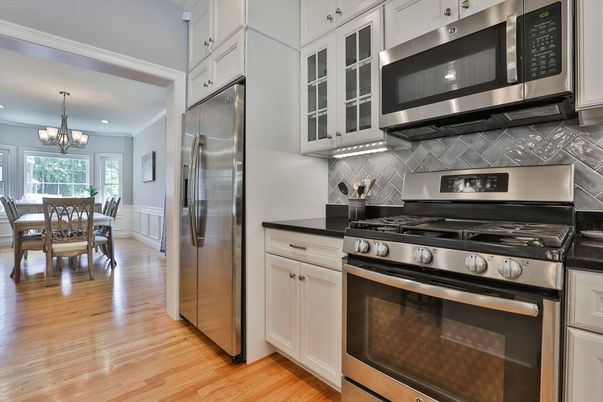 Chandelier, Dining room, Interior, Kitchen, Stainless Steel Appliances, Wood Texture Flooring