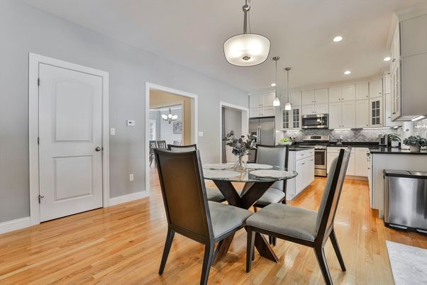 Dining room, Interior, Kitchen, Pendant Lights, Recessed Lighting, Stainless Steel Appliances, Wood Texture Flooring