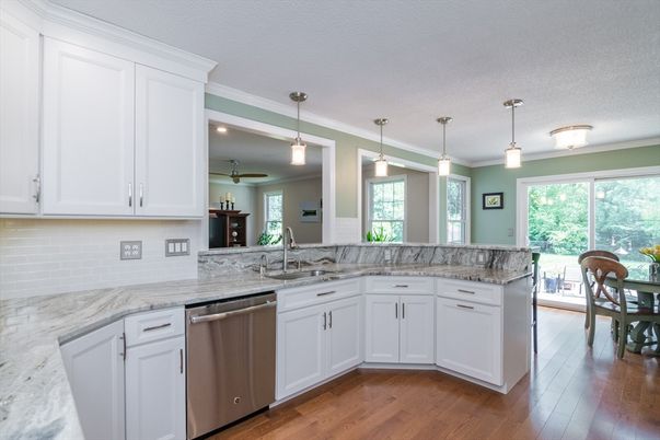 Dining room, Interior, Kitchen, Pendant Lights, Recessed Lighting, Stainless Steel Appliances, Wood Texture Flooring