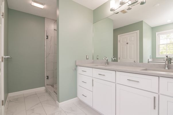 Bathroom, Dual Sink Vanities, Glass Shower, Interior, Marble, Marble Walls, Recessed Lighting