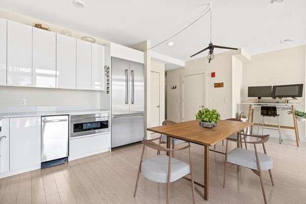 Dining room, Interior, Kitchen, Pendant Lights, Recessed Lighting, Stainless Steel Appliances, Wood Texture Flooring