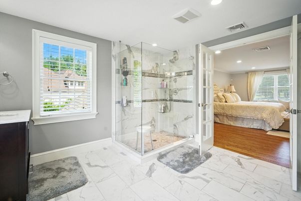 Bathroom, Bedroom, Glass Shower, Interior, Marble, Marble Walls, Recessed Lighting, Wood Texture Flooring
