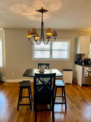 Chandelier, Dining room, Interior, Wood Texture Flooring