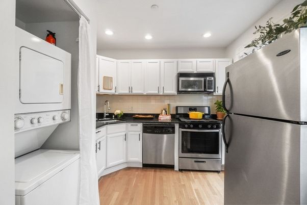 Interior, Kitchen, Recessed Lighting, Stainless Steel Appliances, Washer, Wood Texture Flooring
