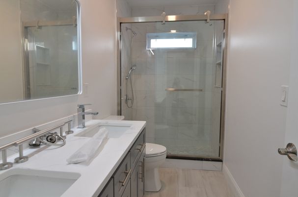 Bathroom, Dual Sink Vanities, Glass Shower, Interior, Marble Walls