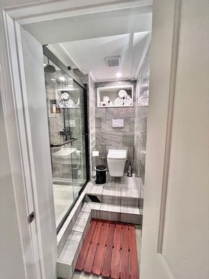 Bathroom, Free Standing Baths, Interior, Marble Walls, Wood Texture Flooring