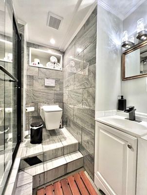 Bathroom, Free Standing Baths, Glass Shower, Interior, Marble Walls, Recessed Lighting