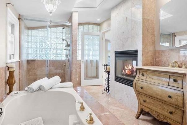 Bathroom, Chandelier, Fireplace, Glass Shower, Interior, Marble Walls, Recessed Lighting