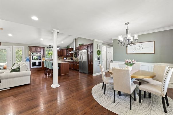 Chandelier, Dining room, Interior, Kitchen, Recessed Lighting, Stainless Steel Appliances, Wood Texture Flooring