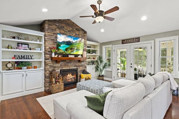 Fireplace, Interior, Living room, Recessed Lighting, Stone Walls, Wood Texture Flooring