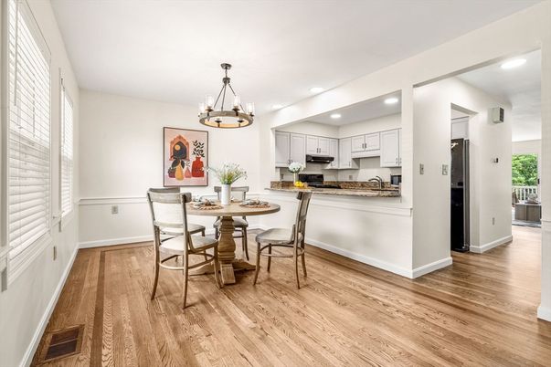 Chandelier, Dining room, Interior, Kitchen, Recessed Lighting, Stainless Steel Appliances, Wood Texture Flooring