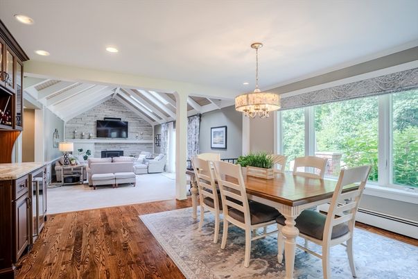 Chandelier, Dining room, Fireplace, Interior, Living room, Recessed Lighting, Stone Walls, Wood Texture Flooring