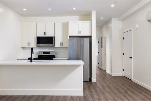 Interior, Kitchen, Recessed Lighting, Stainless Steel Appliances, Wood Texture Flooring