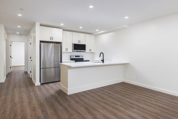 Interior, Kitchen, Recessed Lighting, Stainless Steel Appliances, Wood Texture Flooring