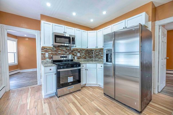 Interior, Kitchen, Recessed Lighting, Stainless Steel Appliances, Wood Texture Flooring