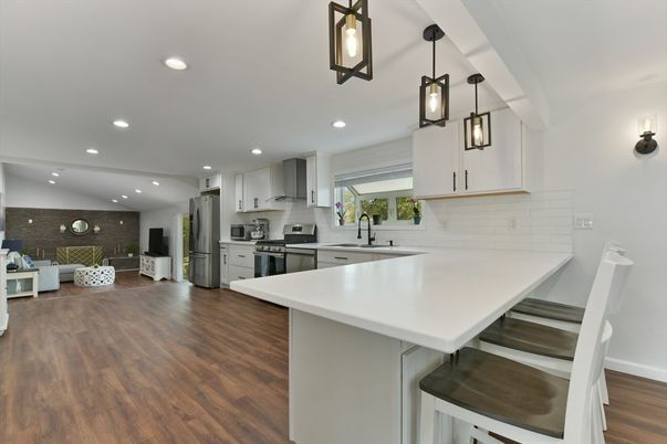 Interior, Kitchen, Pendant Lights, Recessed Lighting, Stainless Steel Appliances, Stone Walls, Wood Texture Flooring
