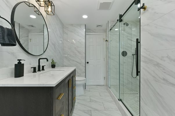 Bathroom, Dual Sink Vanities, Glass Shower, Interior, Marble, Marble Walls, Recessed Lighting