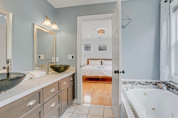 Bathroom, Bedroom, Dual Sink Vanities, Interior, Recessed Lighting, Wood Texture Flooring