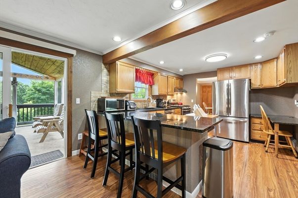 Dining room, Interior, Kitchen, Recessed Lighting, Stainless Steel Appliances, Wood Texture Flooring