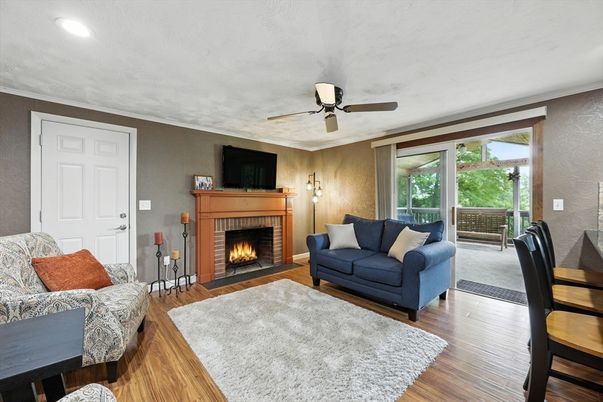 Fireplace, Interior, Living room, Recessed Lighting, Wood Texture Flooring