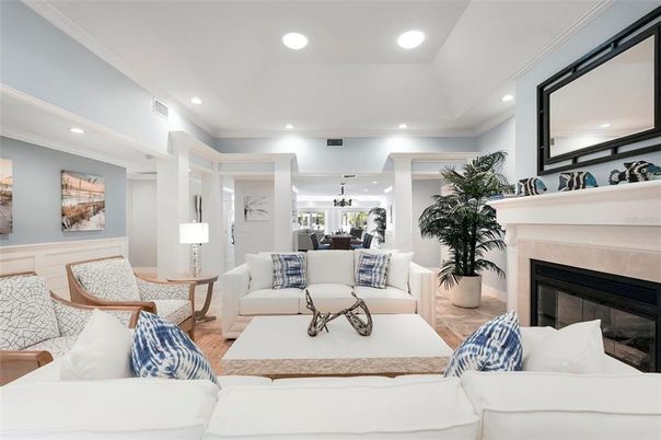 Dining room, Fireplace, Interior, Living room, Pendant Lights, Recessed Lighting, Wood Texture Flooring
