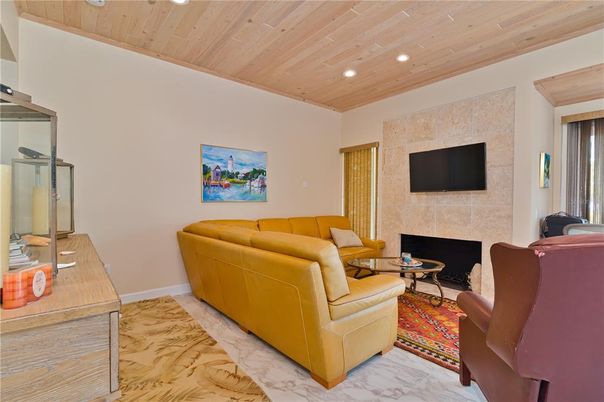 Fireplace, Interior, Living room, Marble, Recessed Lighting, Wooden Ceilings