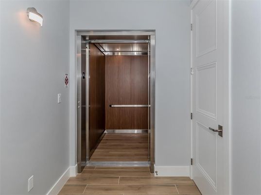 Elevator, Interior, Wood Texture Flooring, Wooden Walls