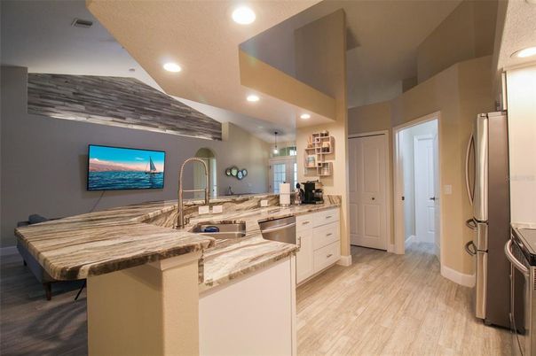 Interior, Kitchen, Wood Texture Flooring, Recessed Lighting, Stainless Steel Appliances