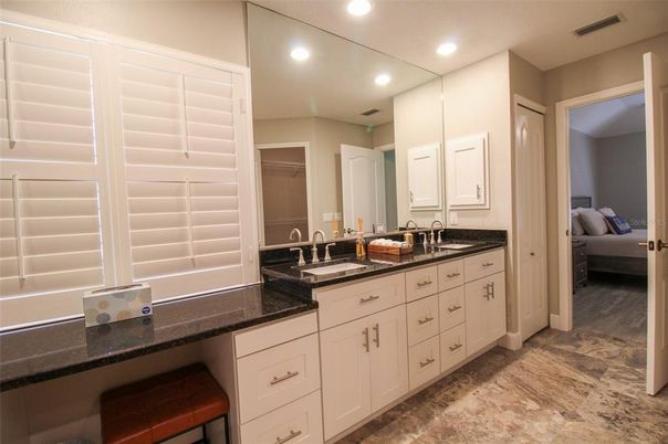 Interior, Bathroom, Recessed Lighting, Walk-in Closets, Ceramic Tile, Dual Sink Vanities