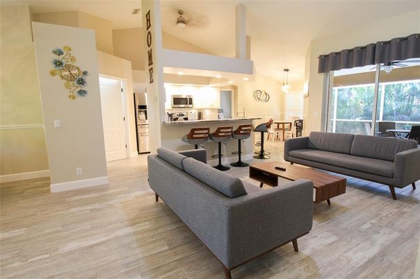 Interior, Kitchen, Wood Texture Flooring, Living room, Dining room, Stainless Steel Appliances, Pendant Lights