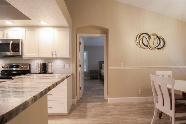 Interior, Kitchen, Wood Texture Flooring, Recessed Lighting, Dining room, Stainless Steel Appliances