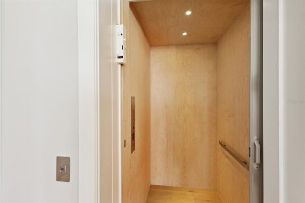 Elevator, Interior, Recessed Lighting, Wooden Ceilings, Wood Texture Flooring, Wooden Walls