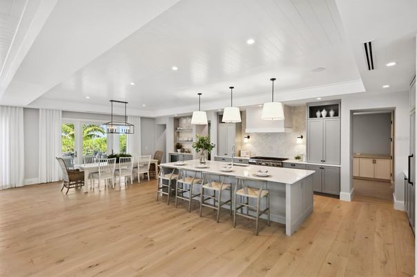 Dining room, Interior, Kitchen, Pendant Lights, Recessed Lighting, Stainless Steel Appliances, Wood Texture Flooring