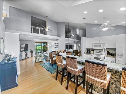 Dining room, Interior, Kitchen, Living room, Pendant Lights, Recessed Lighting, Stainless Steel Appliances, Wood Texture Flooring