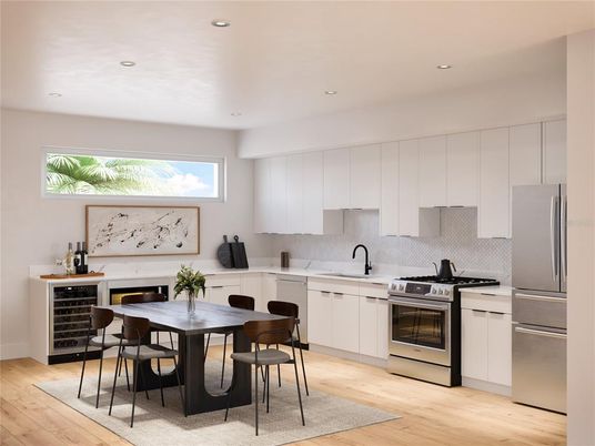 Dining room, Fireplace, Interior, Kitchen, Recessed Lighting, Stainless Steel Appliances, Wood Texture Flooring