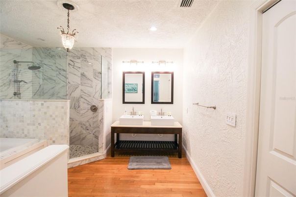Interior, Bathroom, Wood Texture Flooring, Recessed Lighting, Chandelier, Marble Walls, Pendant Lights