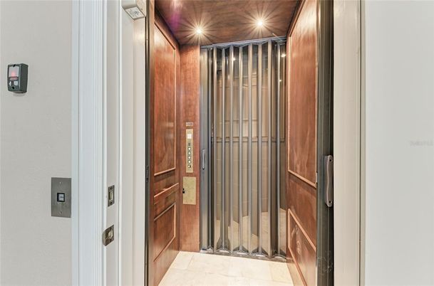 Elevator, Interior, Recessed Lighting, Wooden Ceilings, Wooden Walls