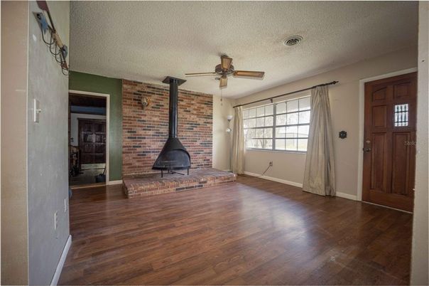 Empty room, Fireplace, Interior, Stone Walls, Wood Texture Flooring