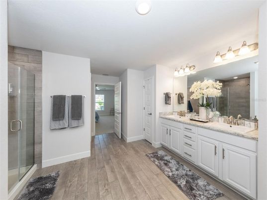 Bathroom, Dual Sink Vanities, Glass Shower, Interior, Wood Texture Flooring