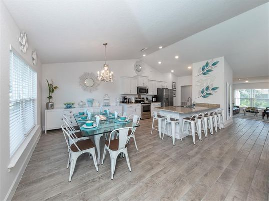 Chandelier, Dining room, Interior, Kitchen, Recessed Lighting, Stainless Steel Appliances, Wood Texture Flooring