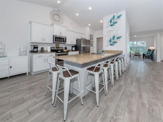 Dining room, Interior, Kitchen, Recessed Lighting, Stainless Steel Appliances, Wood Texture Flooring