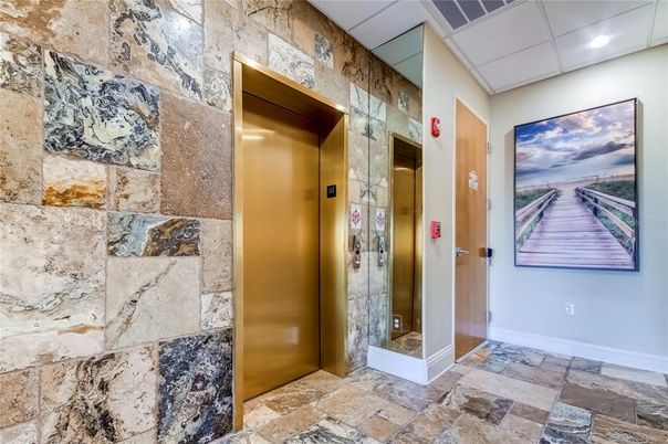 Elevator, Interior, Recessed Lighting, Stone Walls