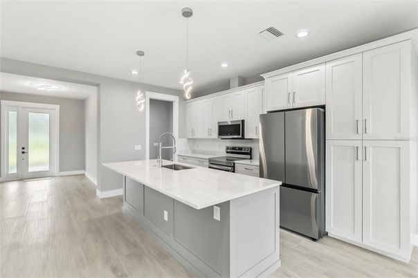 Interior, Kitchen, Pendant Lights, Recessed Lighting, Stainless Steel Appliances, Wood Texture Flooring