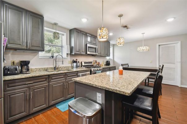 Interior, Kitchen, Pendant Lights, Recessed Lighting, Stainless Steel Appliances, Wood Texture Flooring