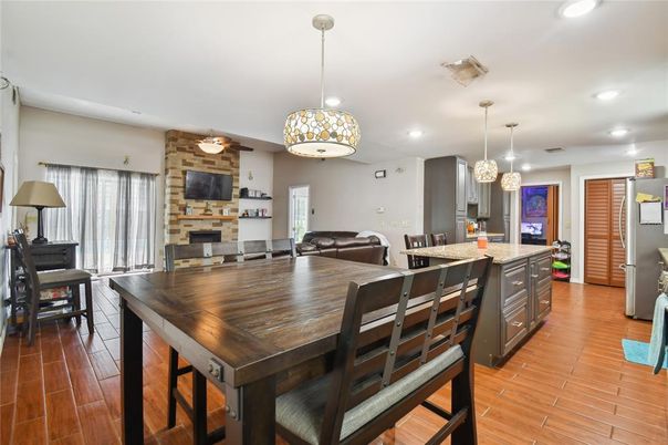 Dining room, Fireplace, Interior, Kitchen, Living room, Pendant Lights, Recessed Lighting, Stone Walls, Wood Texture Flooring
