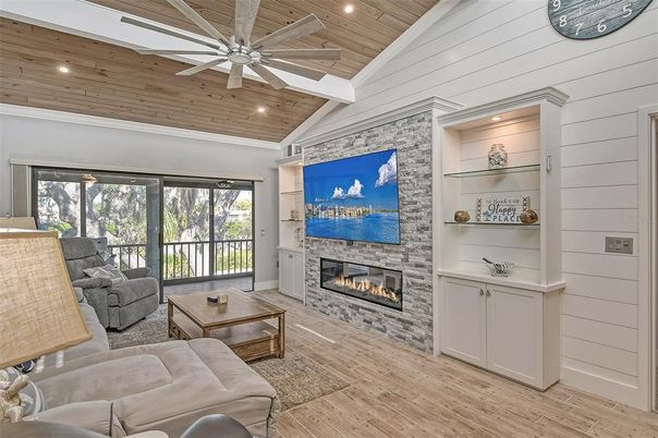 Fireplace, Interior, Living room, Recessed Lighting, Stone Walls, Wooden Ceilings, Wood Texture Flooring