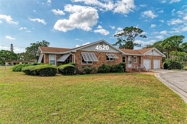 Attached, Exterior, Facade, Brick Facade, Solar Panels, Ranch