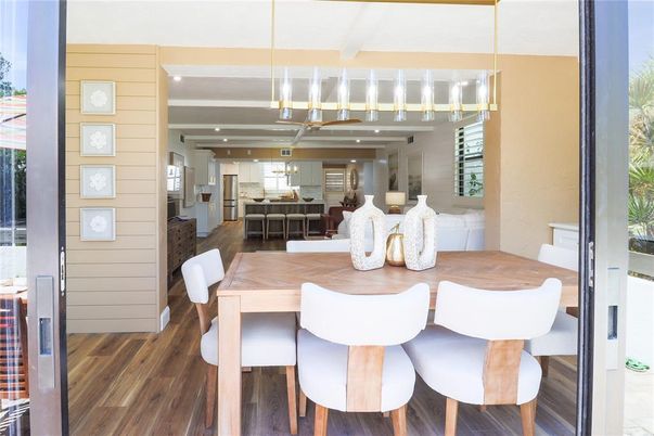 Dining room, Interior, Kitchen, Pendant Lights, Recessed Lighting, Stainless Steel Appliances, Wood Texture Flooring